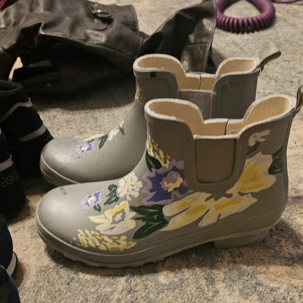 Midi rain boots. Not worn.